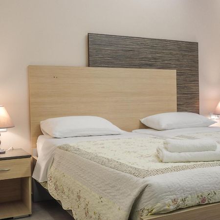 Delfini Beach Hotel & Suites Archangelos  Ngoại thất bức ảnh