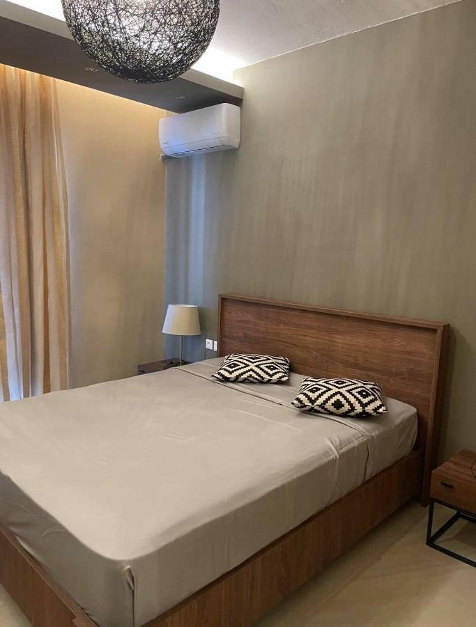 Delfini Beach Hotel & Suites Archangelos  Ngoại thất bức ảnh