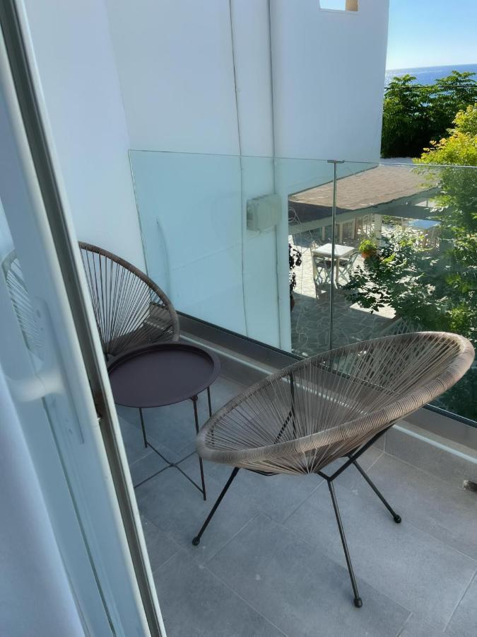 Delfini Beach Hotel & Suites Archangelos  Ngoại thất bức ảnh