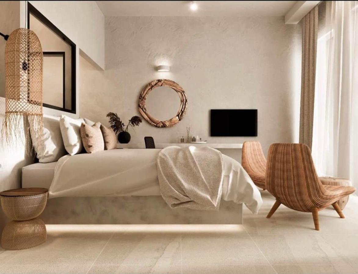 Delfini Beach Hotel & Suites Archangelos  Ngoại thất bức ảnh