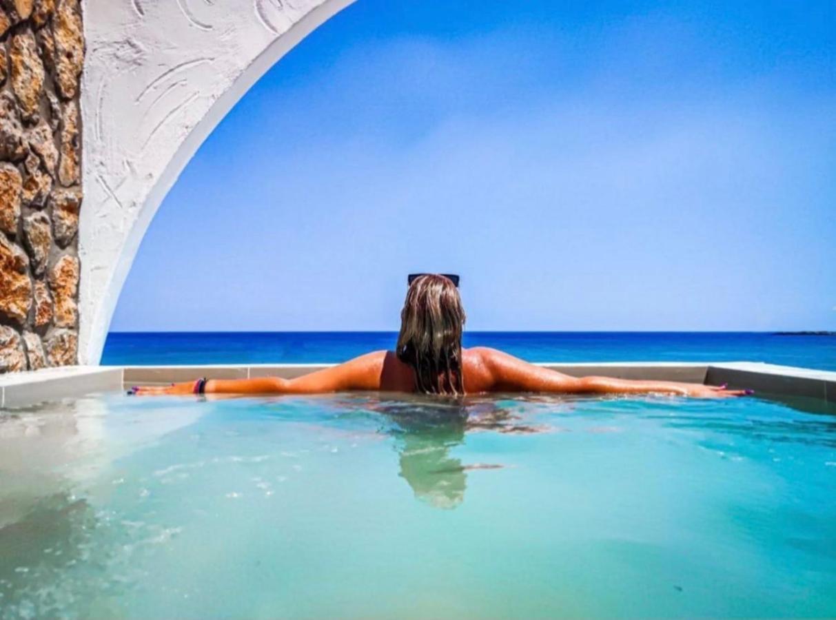 Delfini Beach Hotel & Suites Archangelos  Ngoại thất bức ảnh