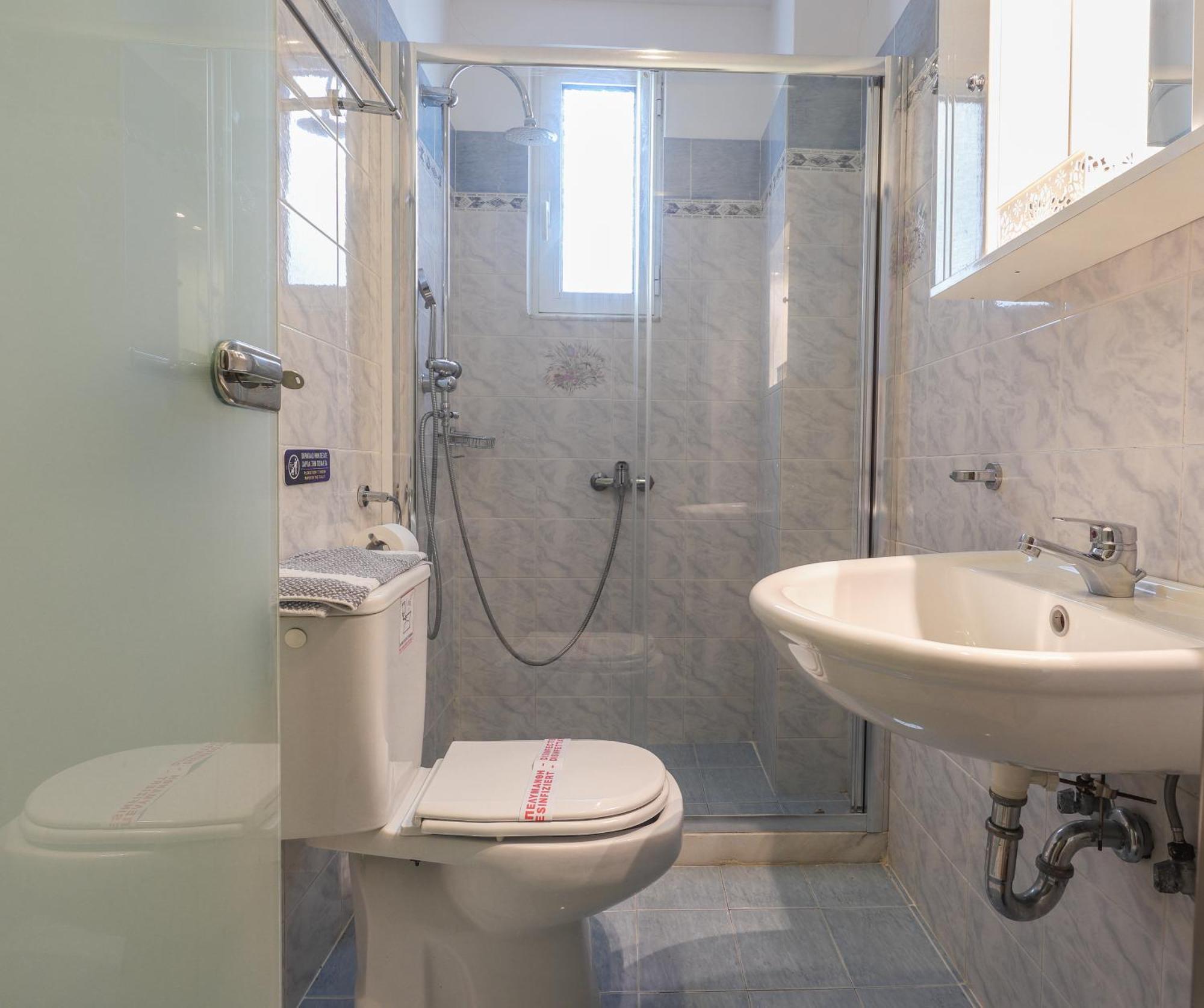 Delfini Beach Hotel & Suites Archangelos  Ngoại thất bức ảnh