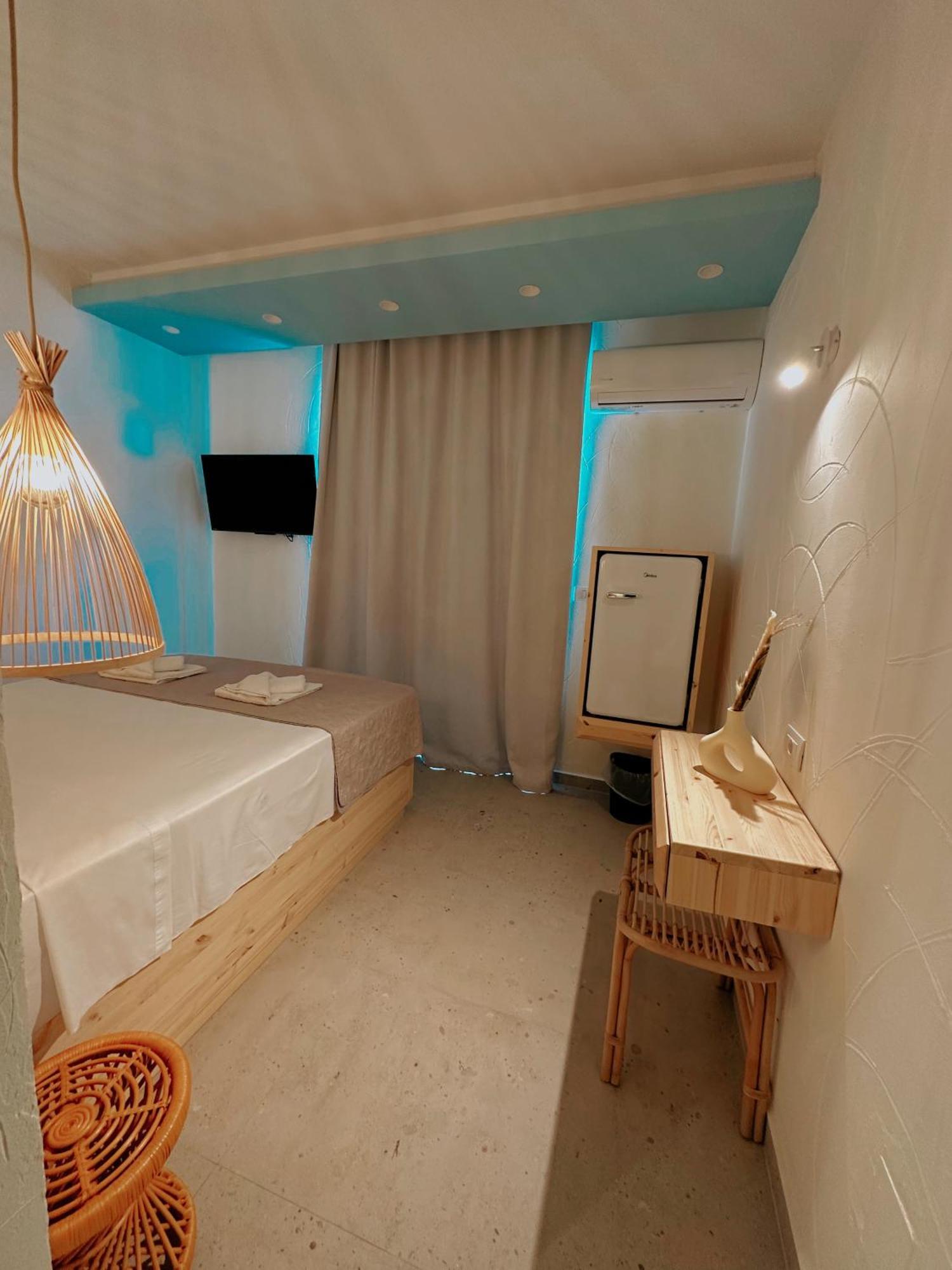 Delfini Beach Hotel & Suites Archangelos  Ngoại thất bức ảnh