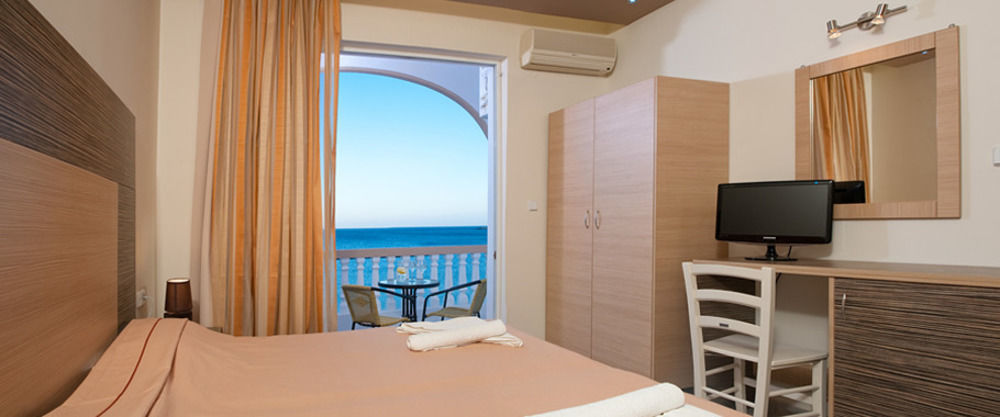 Delfini Beach Hotel & Suites Archangelos  Ngoại thất bức ảnh