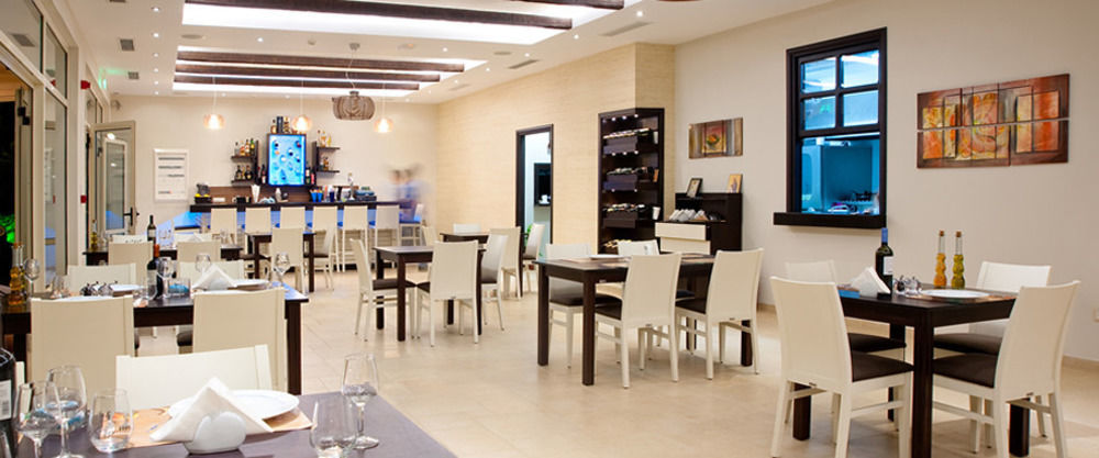 Delfini Beach Hotel & Suites Archangelos  Ngoại thất bức ảnh